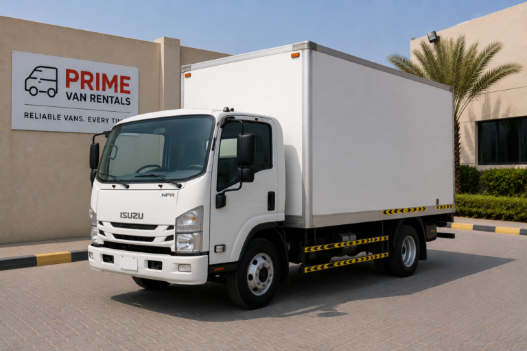 White Isuzu box truck available to rent in Dubai, 5-tonne dry body with rear shutter
