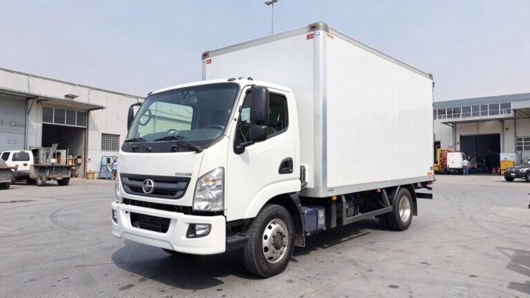 White 3-ton chiller van for rent in Dubai, front three-quarter view