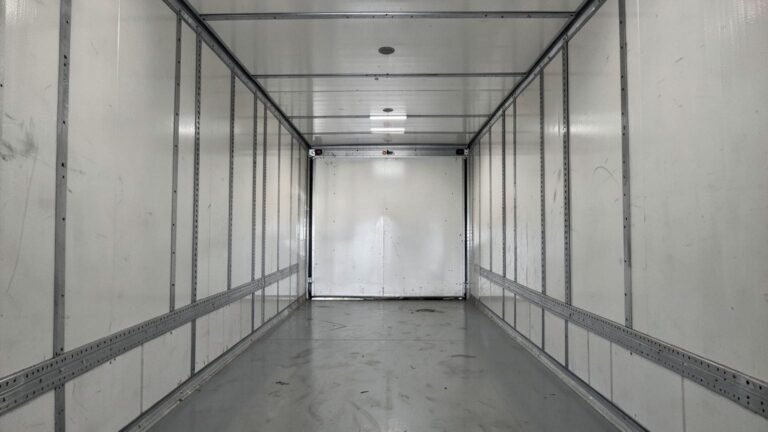 Inside the insulated body of the 3-ton chiller van, looking forward from the rear doors
