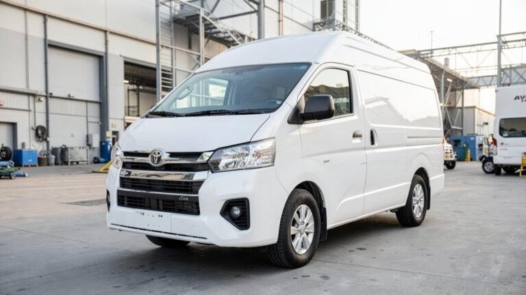 White Toyota Hiace panel van for rent in Dubai, front three-quarter view
