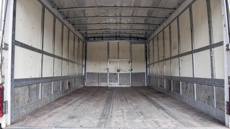 Inside the box body of the 10-tonne box truck, looking forward from the rear doors