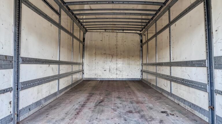 Inside the box body of the 5-tonne box truck, looking forward from the rear doors